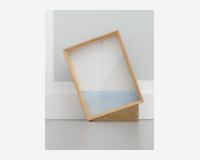 "Toujours le bon niveau (un flet d’eau)" - "Always the right level (a net of water - as they say in French)", 2025 - Cut-out drawing, color pencil on Tyvek paper, 4 pins, box with glass, wood - 30 x 40 cm